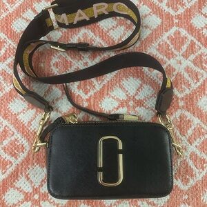 Marc Jacobs Black and Gold Crossbody Bag with Timeless Design